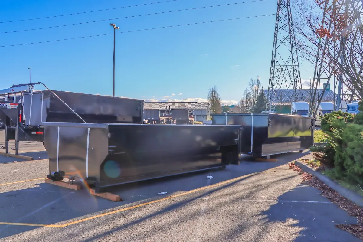 Roll-off dumpster ready for waste disposal at job site for Cleanout Dumpster Rental in Hampton